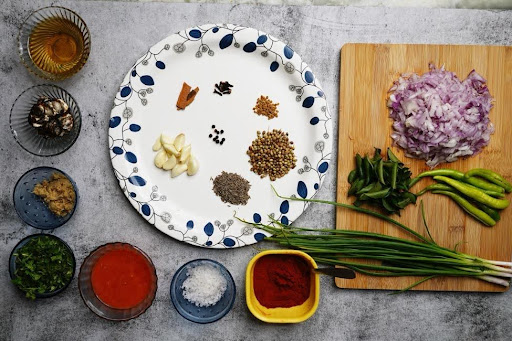 Hyderabad restaurant owner expanding business to the United States with L-1A executive visa and L-1B specialist chef visa for a new Seattle restaurant.